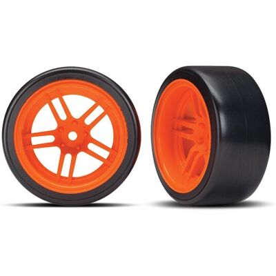 Traxxas - Tires and wheels, assembled, glued (split-spoke orange wheels, 1.9" Drift tires) (rear) (TRX-8377A) Traxxas - Tires and wheels, assembled, glued (split-spoke orange wheels, 1.9" Drift tires) (rear) (TRX-8377A)