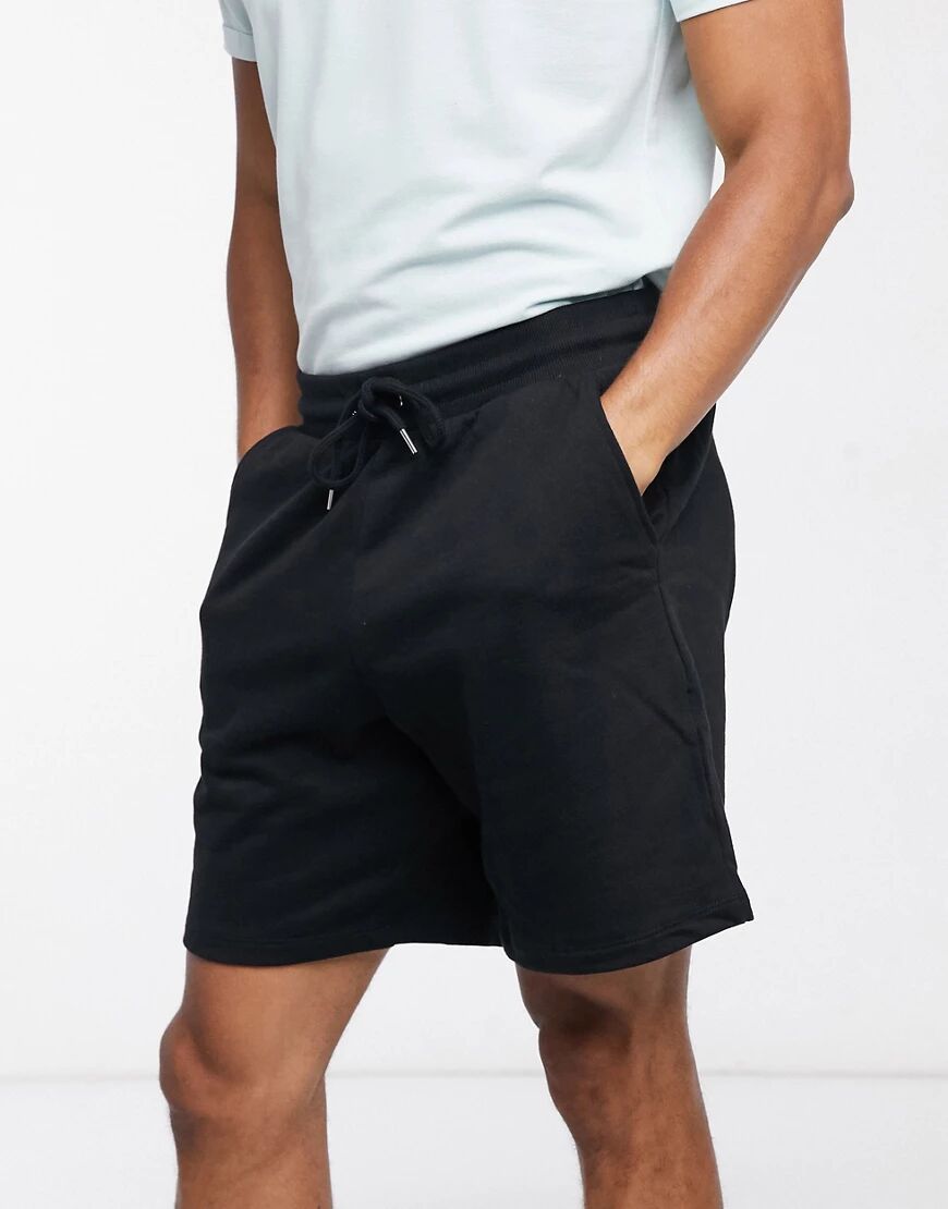 ASOS DESIGN oversized jersey shorts in black  Black