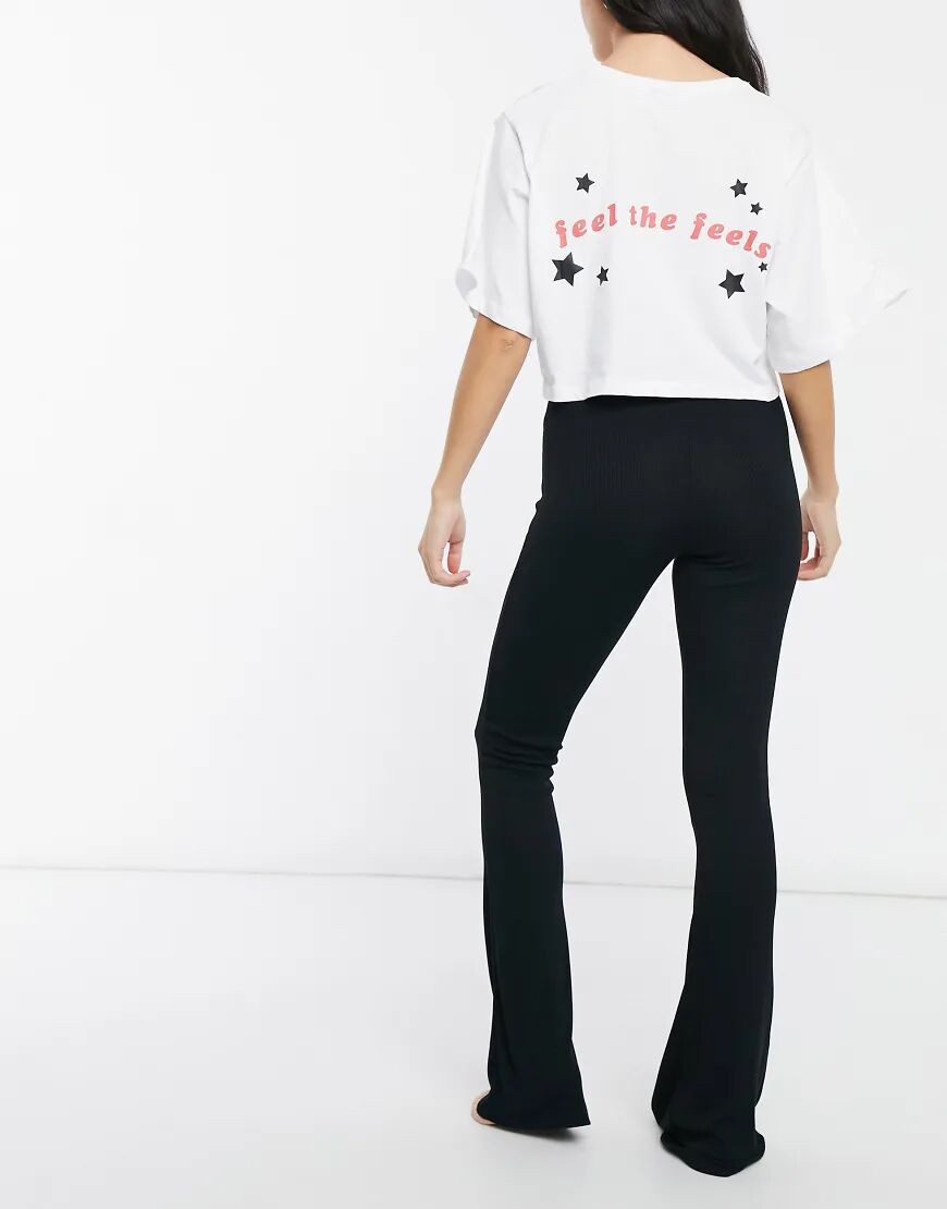 ASOS DESIGN feel the feels cropped tee & flare trouser pyjama set in white & black-Multi  Multi