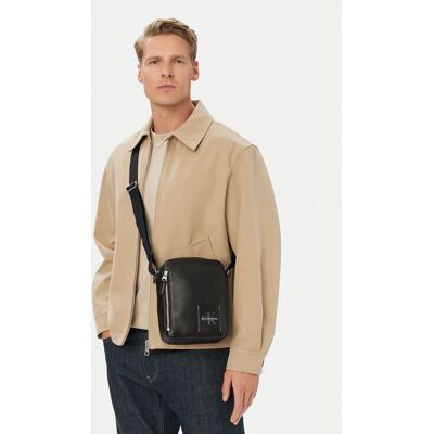 Calvin Klein Saszetka Bold Pebble Simple Reporter LV04D3623G Czarny OS Czarny Męskie Calvin Klein Saszetka Bold Pebble Simple Reporter LV04D3623G Czarny OS Czarny Męskie