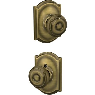 SCHLAGE F10 GEO 609 CAM Camelot Kolekcja gruzińska gałka przejściowa, antyczny mosiądz SCHLAGE F10 GEO 609 CAM Camelot Kolekcja gruzińska gałka przejściowa, antyczny mosiądz