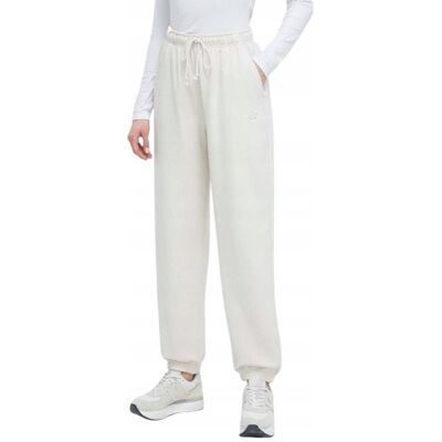Beżowe spodnie Jogger od New Balance - Pants Beżowe spodnie Jogger od New Balance - Pants