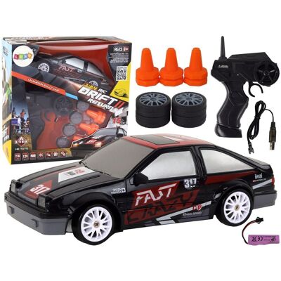 Inny producent Autko Sportowe Zdalnie Sterowane R/C 1:24 Czarne Wymienne Koła Inny producent Autko Sportowe Zdalnie Sterowane R/C 1:24 Czarne Wymienne Koła