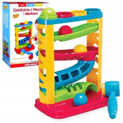 Anek Smily Play, zabawka edukacyjna Zjeżdżalnia z piłeczkami i młotkiem Anek Smily Play, zabawka edukacyjna Zjeżdżalnia z piłeczkami i młotkiem