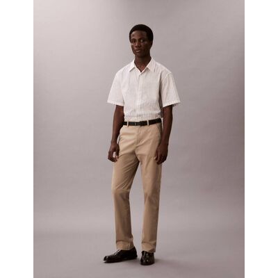 Calvin Klein Jeans Spodnie chino Slim Fit beżowy 34/34 Calvin Klein Jeans Spodnie chino Slim Fit beżowy 34/34