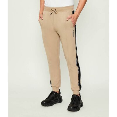 Guess ACTIVE Spodnie dresowe Mickey Regular Fit beżowy L Guess ACTIVE Spodnie dresowe Mickey Regular Fit beżowy L