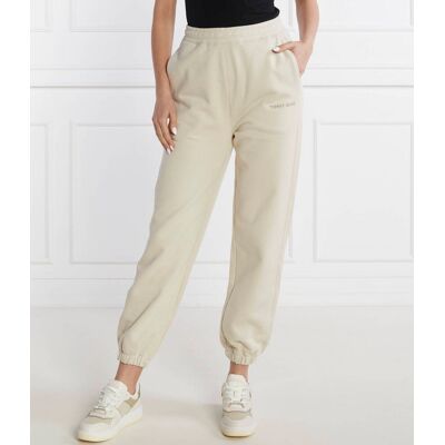 Tommy Jeans Spodnie dresowe CLASSICS EXT Relaxed fit beżowy L Tommy Jeans Spodnie dresowe CLASSICS EXT Relaxed fit beżowy L