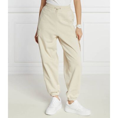 Tommy Jeans Spodnie dresowe Regular Fit beżowy L Tommy Jeans Spodnie dresowe Regular Fit beżowy L