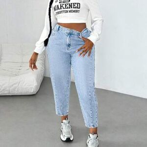SHEIN Damskie luźne, zwężane spodnie jeansowe w kolorze niebieskim z kieszeniami w dużych rozmiarach