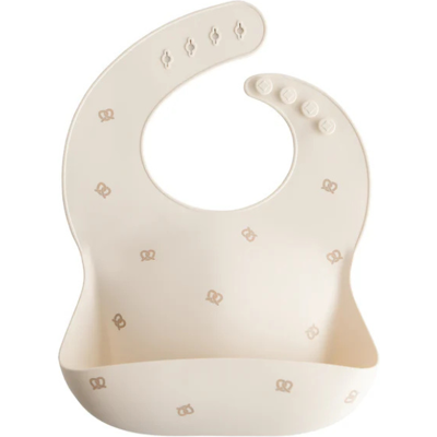 Babador de silicone Mushie com bolso - Pescoço ajustável Babador de silicone Mushie com bolso - Pescoço ajustável