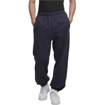 Urban Classics Calças de fato de treino para homem, corte solto, tecido quente, fechos de correr nos tornozelos, tamanhos XS, 5XL, Azul (naval), M Urban Classics Calças de fato de treino para homem, corte solto, tecido quente, fechos de correr nos tornozelos, tamanhos XS, 5XL, Azul (naval), M