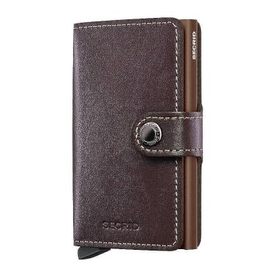 Secrid A MiniWallet tem um tamanho compacto, mas tem uma capacidade surpreendente. A capa de couro exterior pode conter bilhetes, recibos e cartões, enquanto está no protetor in All Secrid A MiniWallet tem um tamanho compacto, mas tem uma capacidade surpreendente. A capa de couro exterior pode conter bilhetes, recibos e cartões, enquanto está no protetor in All