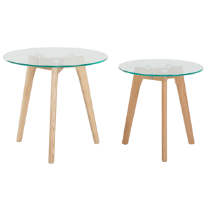 Conjunto de 2 mesas com tampo de vidro redondo transparente 3 pés de madeira clara design minimalista escandinavo