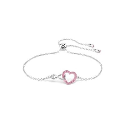 Swarovski Hyperbola-armband, hjärta och oändlighetsmotiv med rosa pavékristaller i en Rhodium-färdig miljö, del av Hyperbola-kollektionen Swarovski Hyperbola-armband, hjärta och oändlighetsmotiv med rosa pavékristaller i en Rhodium-färdig miljö, del av Hyperbola-kollektionen