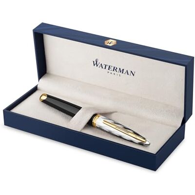 Waterman Carene reservoarpenna Metall och svart lack med gulddetalj och utmejslat lock Mediumspets i 18K guld Blått bläck Presentask Waterman Carene reservoarpenna Metall och svart lack med gulddetalj och utmejslat lock Mediumspets i 18K guld Blått bläck Presentask