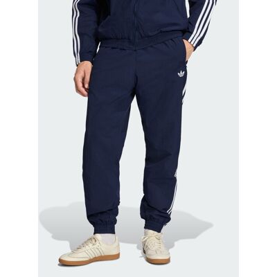 adidas Teplákové nohavice Firebird Woven KE1370 Tmavomodrá Regular Fit Muži adidas Teplákové nohavice Firebird Woven KE1370 Tmavomodrá Regular Fit Muži
