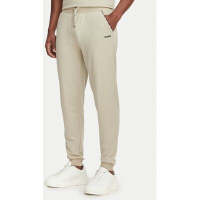 HUGO Teplákové nohavice Noah 50566158 Béžová Regular Fit Muži HUGO Teplákové nohavice Noah 50566158 Béžová Regular Fit Muži