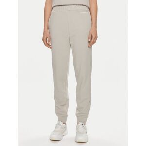 Calvin Klein Teplákové nohavice Micro Logo K20K206632 Béžová Regular Fit Ženy Calvin Klein Teplákové nohavice Micro Logo K20K206632 Béžová Regular Fit Ženy