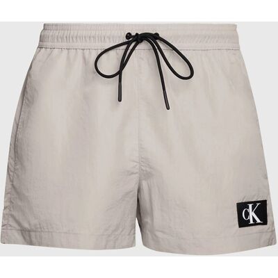Pánske plavky KM0KM00979 PE0 beige - Calvin Klein XL Pánske plavky KM0KM00979 PE0 beige - Calvin Klein XL