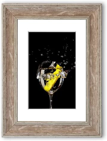 East Urban Home 'Gin And Tonic Lemon Splash Cornwall' Framed Photographic Print East Urban Home Size: 50 cm H x 70 cm W, Frame Options: Walnut Washed  - Size: 50 cm H x 70 cm W