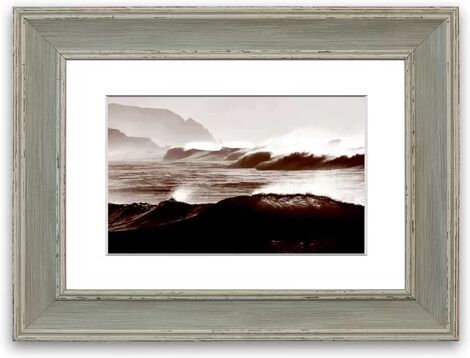 East Urban Home 'Chocolate Waves Crashing Cornwall Living Room' Framed Photographic Print East Urban Home Size: 70 cm H x 93 cm W, Frame Options: Blue  - Size: 93 cm H x 126 cm W