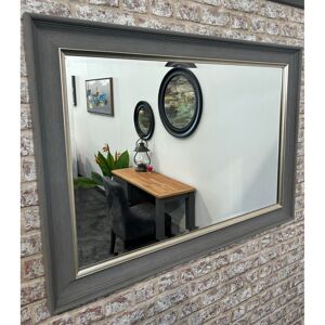 Ebern Designs Panos Framed Wall Mounted Accent Mirror Light Grey and Silver Trim 115cm x 65cm Ebern Designs Panos Framed Wall Mounted Accent Mirror Light Grey and Silver Trim 115cm x 65cm