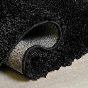 Ebern Designs Epiphany Solid Colour Shaggy Black Area Rug Black Rectangle 80 x 150cm Ebern Designs Epiphany Solid Colour Shaggy Black Area Rug Black Rectangle 80 x 150cm