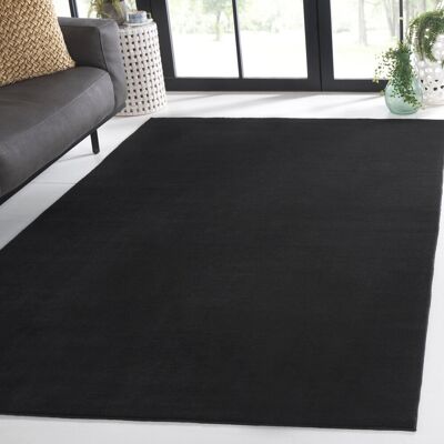 Latitude Run Anraj Solid Colour Power Loom Black Area Rug Black Rectangle 183 x 274cm Latitude Run Anraj Solid Colour Power Loom Black Area Rug Black Rectangle 183 x 274cm
