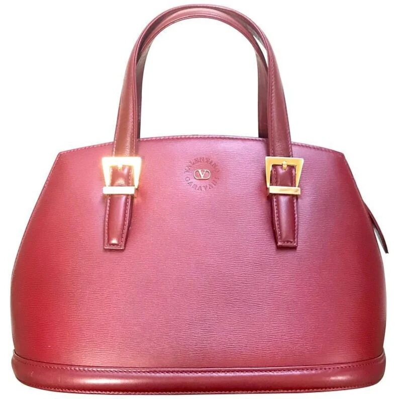 Valentino Vintage Garavani wine leather handbag with golden buckles