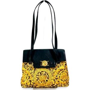 GIANNI VERSACE Vintage nylon and leather shoulder bag in leopard and golden gorgeous prints with sun burst motif