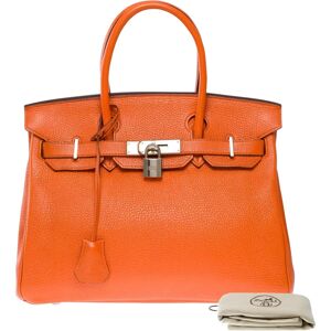 Amazing & Bright Birkin 30 handbag in Orange H Togo leather, SHW - Size: 30x22x15 cm (11.8x8.7x5.9 Inches) Reference: 101246 General condition: 6.5/10 To our that the bag was pampered in a specialized spa Hermes for color retouching Sold with copy of the 