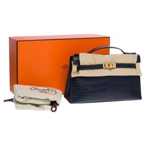 New Kelly Clutch handbag in Blue Indigo matte Crocodile leather , GHW - Size: 22x12x7 cm (8,7x4,7x2,7 Inches) Reference: 101375 General condition: 9.5/10 Sold with copy of the Hermes invoice , Cites, felt, dustbag and box In Mint condition Option in addit