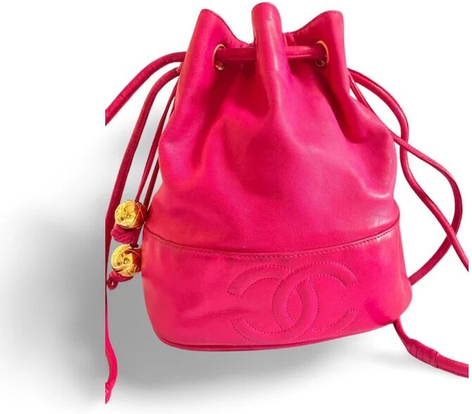 Chanel Vintage fusia pink lambskin hobo bucket shoulder bag with CC golden balls and CC stitch mark