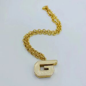 Givenchy Re-engineered Vintage Whistle Keychain 1970s - 1979 Collection - Size: L 20 in Condition: ExcellentThis item has been used and may have some minor flaws. Before purchasing, please refer to the images for the exact condition of the item.