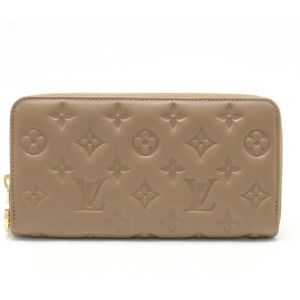 LOUIS VUITTON Monogram Embossed Zippy Wallet Round Long Lamb Leather Taupe Greige M81511