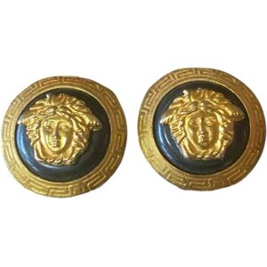 GIANNI VERSACE Vintage black and gold candy earrings with Medusa face