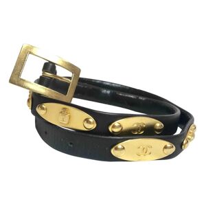 Chanel Vintage black belt with golden buckle and iconic logo motifs, CC mark, camellia flower, turtle, perfume, clover