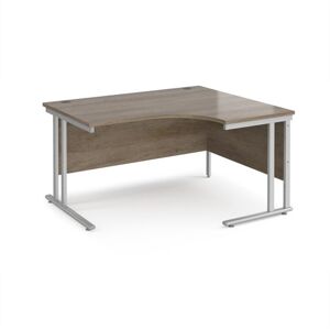 Maestro 25 right hand ergonomic desk 1400mm wide - silver cantilever leg frame, Nebraska oak top Maestro 25 right hand ergonomic desk 1400mm wide - silver cantilever leg frame, Nebraska oak top