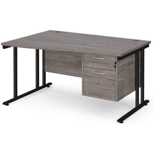Maestro 25 left hand wave desk 1400mm wide with 2 drawer pedestal - black cantilever leg frame, grey oak top Maestro 25 left hand wave desk 1400mm wide with 2 drawer pedestal - black cantilever leg frame, grey oak top