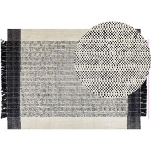 Beliani - Living Room Area Rug Wool Decorative Tassels 140 x 200 cm White and Black Ketenli - White