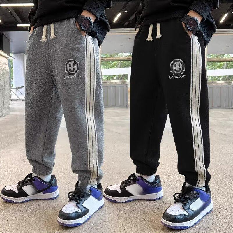 Fashion human Children's clothing boys trousers spring and autumn models of the new middle and large boys boys sports sweatpants spring trousers