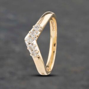 Pre-Owned 9ct Yellow Gold 0.15ct Brilliant Cut Diamond Five Stone Half Wishbone Ring 41382818 Pre-Owned 9ct Yellow Gold 0.15ct Brilliant Cut Diamond Five Stone Half Wishbone Ring 41382818