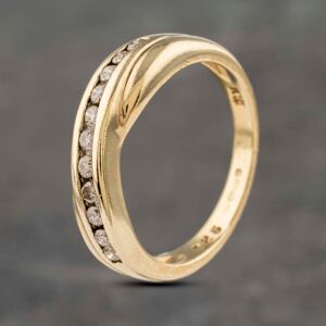 Pre-Owned 9ct Yellow Gold 0.25ct Brilliant Cut Diamond Crossover Half Eternity Ring 41383024 Pre-Owned 9ct Yellow Gold 0.25ct Brilliant Cut Diamond Crossover Half Eternity Ring 41383024