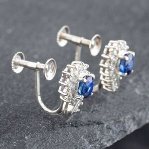 Pre-Owned Platinum 0.90ct Oval Cut Sapphire & 0.22ct Brilliant Cut Diamond Stud Earrings 43171038 Pre-Owned Platinum 0.90ct Oval Cut Sapphire & 0.22ct Brilliant Cut Diamond Stud Earrings 43171038