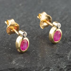 Pre-Owned Yellow Gold 0.43ct Oval Cut Ruby & Diamond Stud Earrings 43171086 Pre-Owned Yellow Gold 0.43ct Oval Cut Ruby & Diamond Stud Earrings 43171086