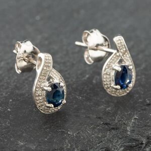 Pre-Owned White Gold 0.43ct Oval Cut Sapphire & 0.03ct Diamond Swirl Stud Earrings 43171088 Pre-Owned White Gold 0.43ct Oval Cut Sapphire & 0.03ct Diamond Swirl Stud Earrings 43171088