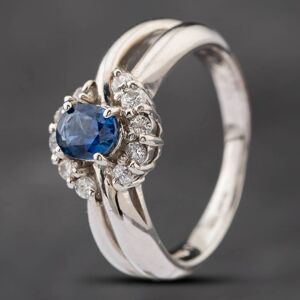Pre-Owned Platinum 0.58ct Sapphire & 0.20ct Brilliant Cut Diamond Round Cluster Ring 43361095 Pre-Owned Platinum 0.58ct Sapphire & 0.20ct Brilliant Cut Diamond Round Cluster Ring 43361095