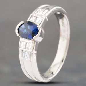 Pre-Owned Platinum 0.29ct Sapphire & 0.81ct Emerald Cut Diamond Oval Dress Ring 43361117 Pre-Owned Platinum 0.29ct Sapphire & 0.81ct Emerald Cut Diamond Oval Dress Ring 43361117