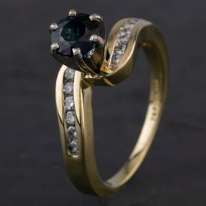 Pre-Owned 14ct Yellow Gold Sapphire & 0.24ct Brilliant Cut Diamond Diamond Set Shoulders Twist Design Fancy Ring 4336165 Pre-Owned 14ct Yellow Gold Sapphire & 0.24ct Brilliant Cut Diamond Diamond Set Shoulders Twist Design Fancy Ring 4336165