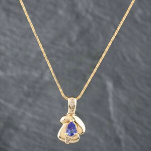 Pre-Owned 14ct Yellow Gold 1.00ct Tanzanite & 0.18ct Brilliant Cut Diamond Pear Shaped Pendant & 16 Inch Herringbone Chain 4314155112 Pre-Owned 14ct Yellow Gold 1.00ct Tanzanite & 0.18ct Brilliant Cut Diamond Pear Shaped Pendant & 16 Inch Herringbone Chain 4314155112